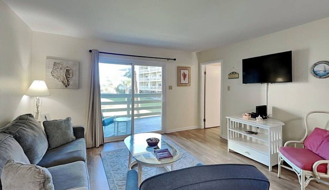 Spacious Beachfront Living w/Large Balcony + Community Pool!