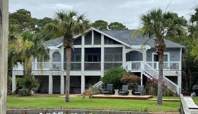 Spectacular 5-Star on the creek home, 6 cards & 6 seat Golf Cart w/full wk stay