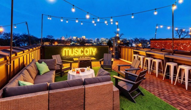 Summer rooftop decks, karaoke garage, game room near Broadway