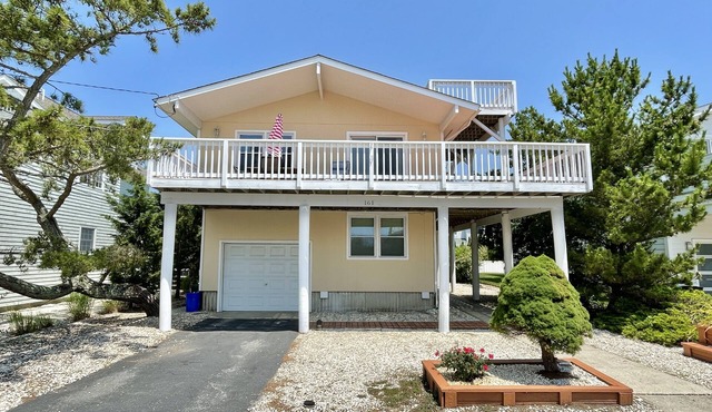This classic 4 Bedroom, 2 Full Bath home is only 1/2 block to beach