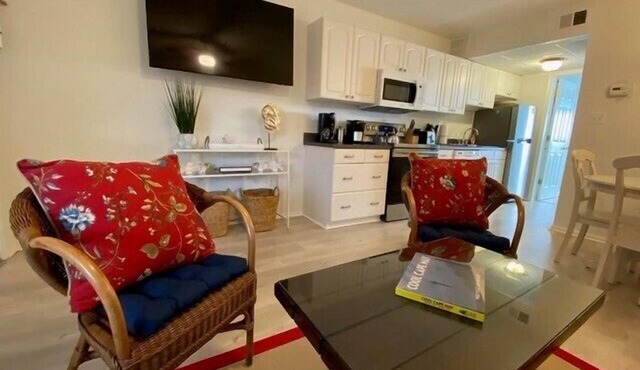 Top floor unit with water view from bedroom!