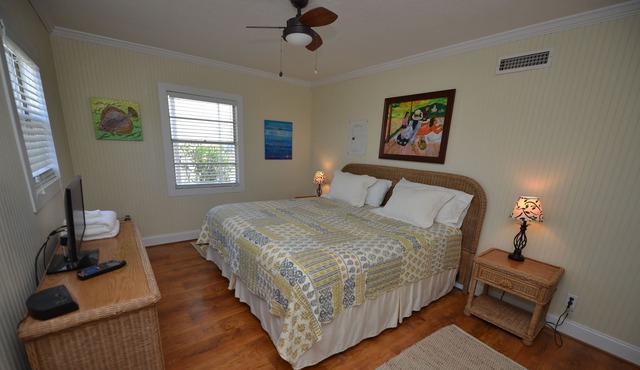 **TROUT ** Close beach access. lovely two bedroom w/ screened porch and pool