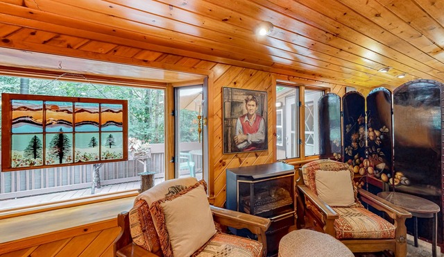 Unique home with enclosed yard, grill, covered porches and firepit