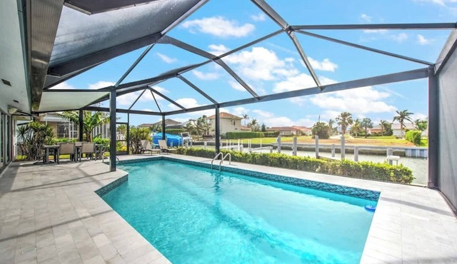 Walking Distance to the Beach! Canal/Pool Home!