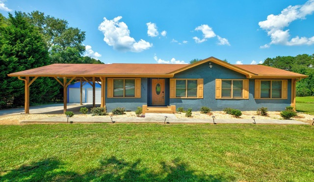 Welcome Rivertown Manor & Est: A fully renovated 3BR/2BA modern estate on 2 private acres. Engineered for the traveling professional, this home features a gourmet kitchen, spa-inspired master suite, and an expansive outdoor patio with a fire pit.