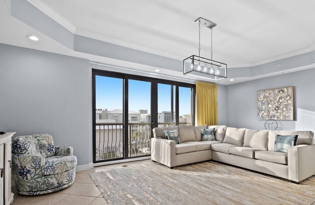 4th-Floor Condo w/Balcony, Partial Gulf Views, A/C, W/D, and Shared Outdoor Pool