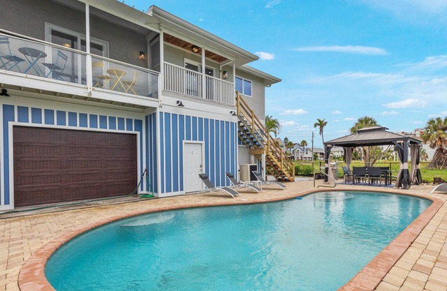 8057 Estero Blvd | Upgraded Beach Home + Heated Pool!