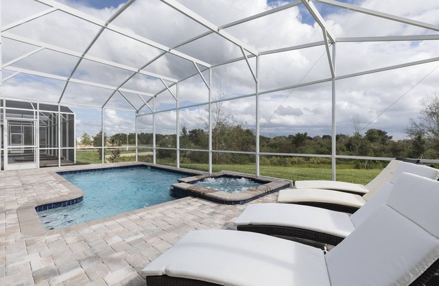 Exquisite 8BR Villa with Pool & Games | Champions Gate - 1509