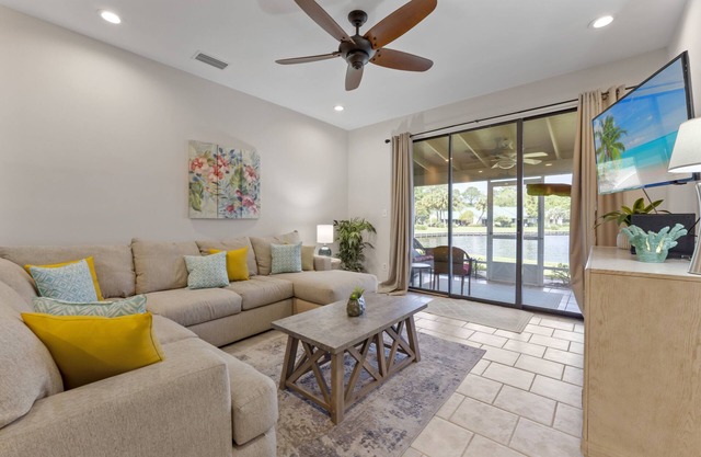 Lakefront Villa w/2 GOLF CARTS! Screened Porch, Bay Views. Near Beach & Pool