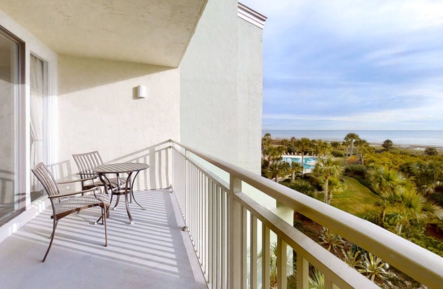 Oceanfront condo with large balcony, pool, central AC & views