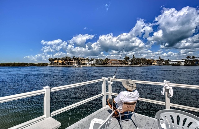 Renovated 2-Bedroom Condo | Walk to Beach | Heated Pool | Bay Views | Daily Free Activities