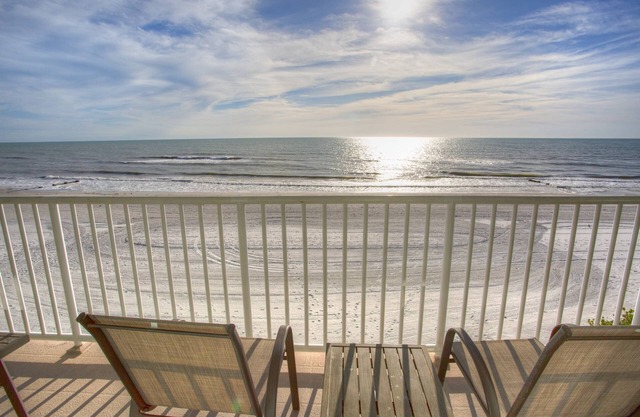 Spacious beachfront comfortable 3-bedroom 2-bath. Heated pool. Great location for a FL vacation.