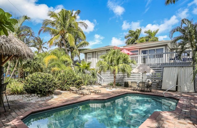 Stylish home w. tropical landscaping, private pool + hot tub