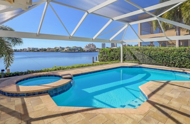 Stylish waterfront home w/ spectacular view, heated pool & hot tub