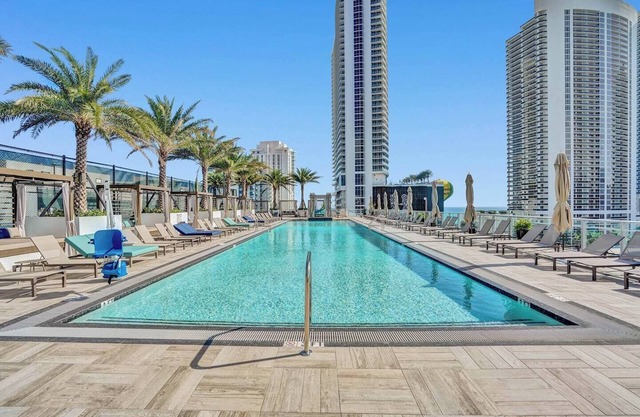 This Amazing 2-bedroom corner unit boasts breathtaking views and sleek luxuryrn design