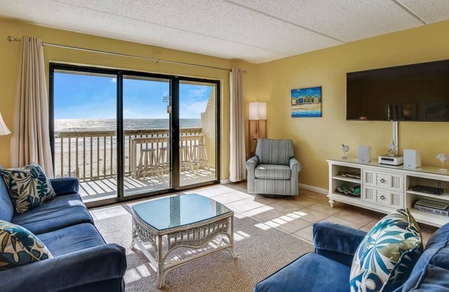 This beautifully remodeled beachfront town home Villa.