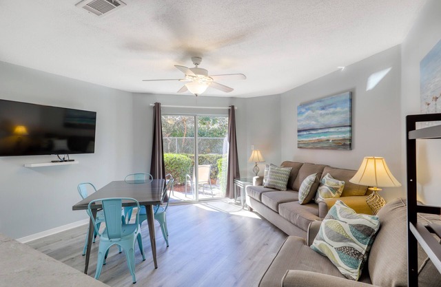 Trendy condo with full kitchen, shared pool, and easy beach access