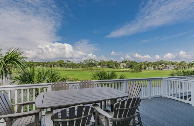 View the fairways & water all around and a slice of ocean view to boot!