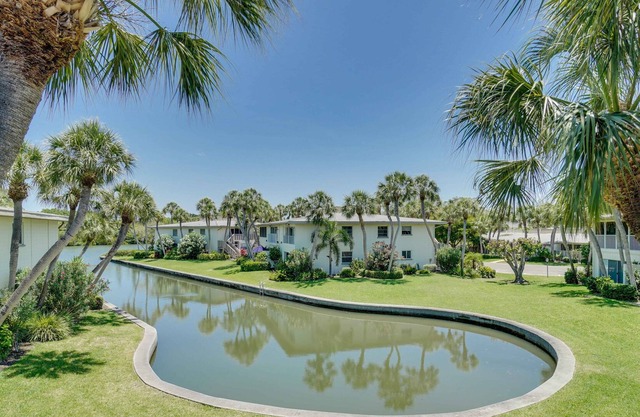 Watch Manatees outside your Window only Steps to the Beach and Pool.