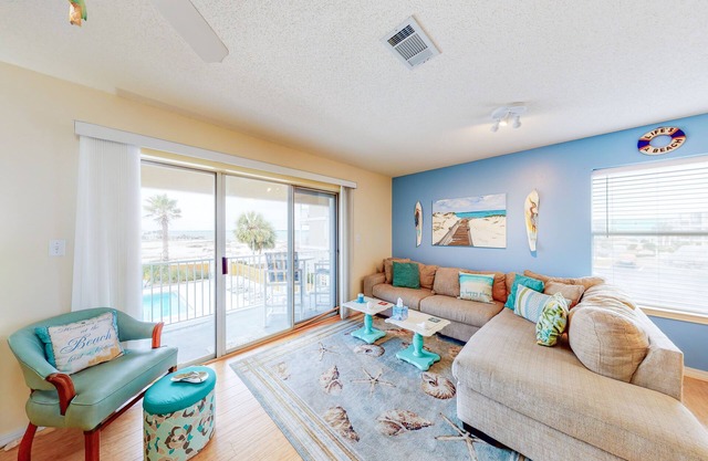 Water-view haven with sound-view balcony, shared pool, WiFi, and AC