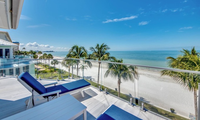 Mid Island House | 251 Key West Court: HUGE Luxe Beachfront Pool Home Steps from the Sand