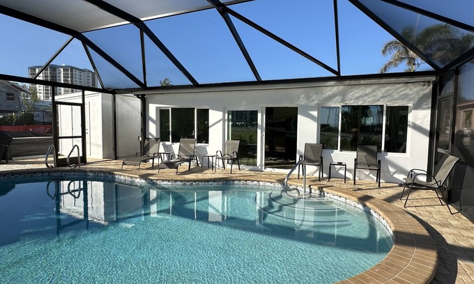 Mid Island House | 4850 Coral - Dog Friendly Home with Pool by the Beach & Publix!