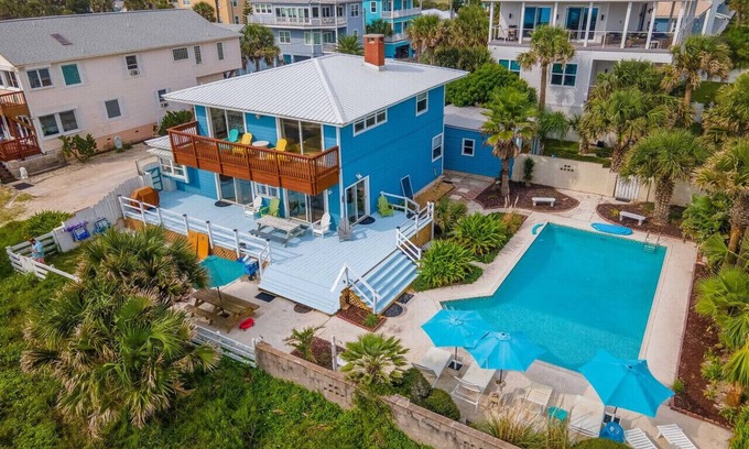 St. Augustine Beach House | Blue dolphin beach front cottage 5 star home- large private pool - one of a kind