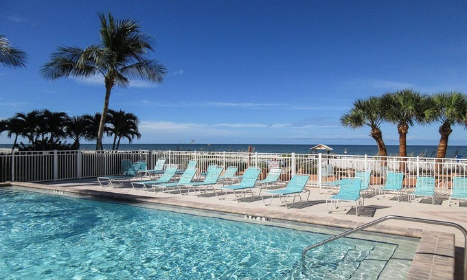 South Island Condo | Brand New Listing At Bargain Price! Beachfront Leonardo Arms 407 Offers Sun and Fun!