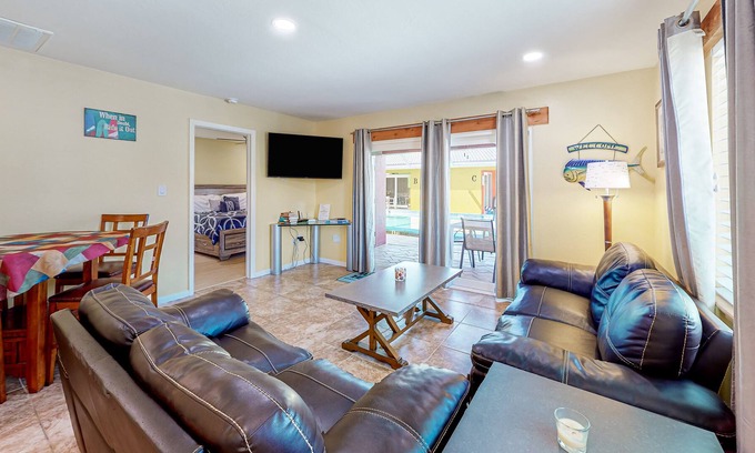 Caloosahatchee Condo | Canal-front condo with pool, boat slip, deck, central AC, & fast WiFi