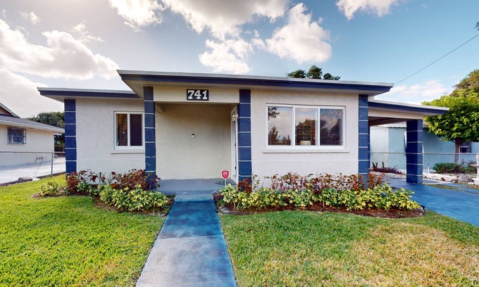 Riviera Beach House | Cozy home with B.B.Q.grill, hot tub, central AC, and enclosed yard
