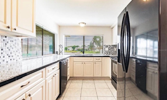 Holiday House | Florida Family Friendly, Waterfront Getaway Near Beaches and Parks!