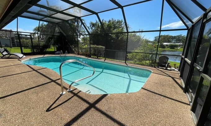 East Naples House | Great family home with a new sparkling pool,lovely lake view, 5 Minutes to beach