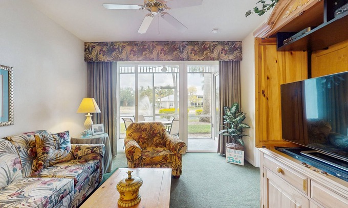 Naples Condo | Lakefront home with water view, golf, pool, hot tub, & tennis