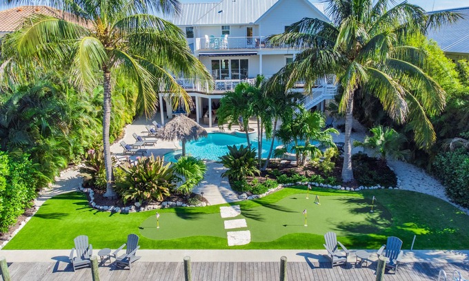 Anna Maria House | Large Canal Front Family Rental on Anna Maria with Pool, Dock & Mini Golf!