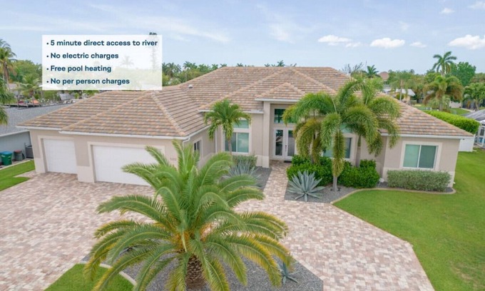 Yacht Club House | Luxury home w/2 suites, LARGE pool, spa, lanai. Quick gulf access! 5 Bikes! EV!
