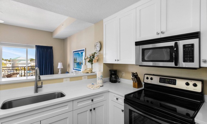 Madeira Beach Condo | 🌅 Madeira Bay Resort #301 – Scenic One-Bedroom Retreat with Marina Views & Pet-Friendly Comfort