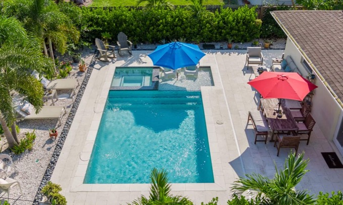 Naples Park House | Naples Park Pool & Spa Home 1 Mile to Beach and Tropical Oasis Fenced Yard.