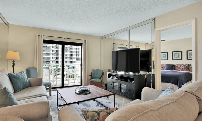 New Smyrna Beach Condo | Ocean/beach-view condo with balcony & heated pool - snowbirds welcome