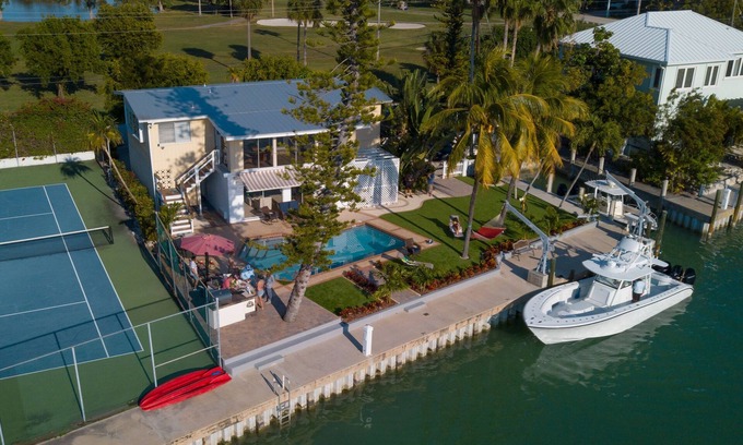 Marathon House | Ocean Side Waterfront Exclusive Affordable Home - Pool , Tennis, Fishing & Golf