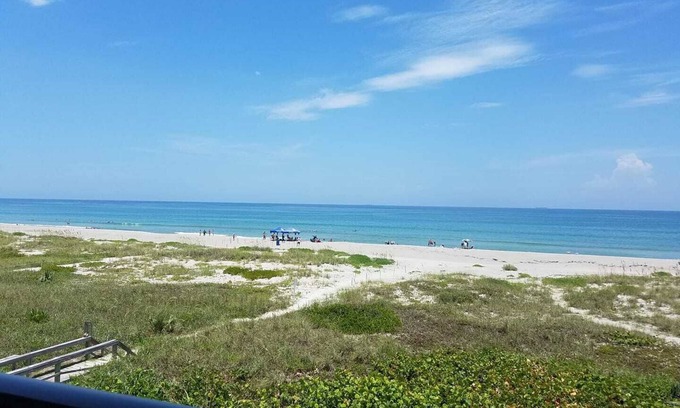 Cocoa Beach Condo | Oceanfront Condo with wrap around balcony. Direct beach access. See Winter rates