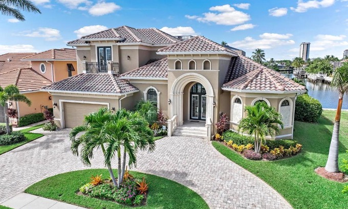 Marco Island House | Opulent waterfront home with pool, spa, dock and deck