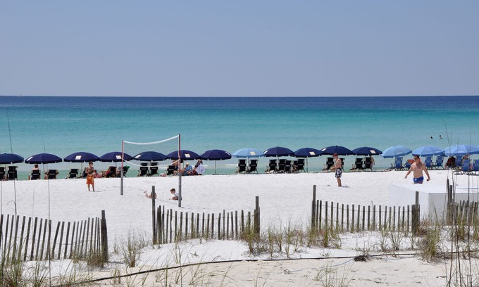 Gulf Pines Condo | Paradise Found: Experience Beachfront Accommodations ~ Resorts Largest Pool Deck