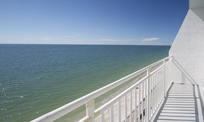 Sunset Beach Condo | Picture Perfect Views From Every Window! Corner Unit on Sunset Beach in Treasure Island.
