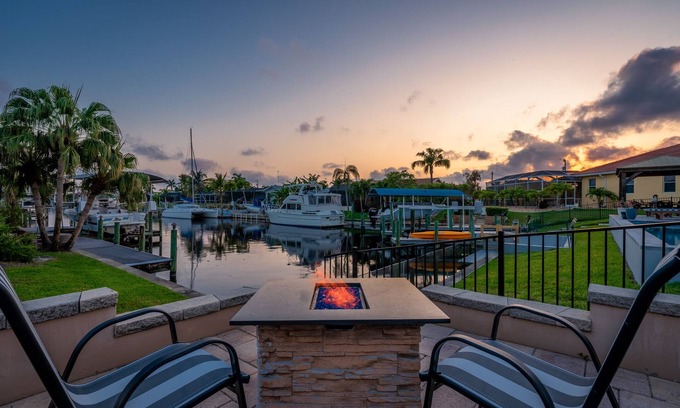 Caloosahatchee House | Poolside Paradise -heated pool, hot tub and game room! Waterfront Canal Views!
