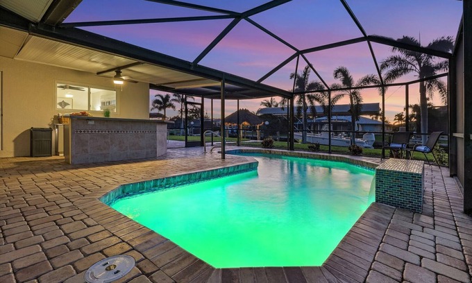 Yacht Club House | Renovated 3-bed, 2-bath home with pool, dock, bar, patio, and waterfront access.