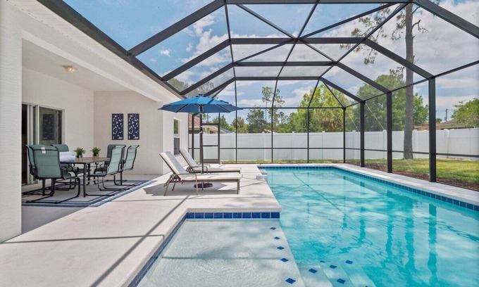 Palm Coast House | Renovated Heated Pool home with Game room and Bicycles