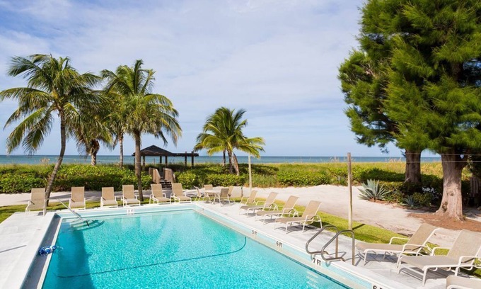 Captiva House | South Seas Beach House 15 - Direct gulf front home with pool and tennis