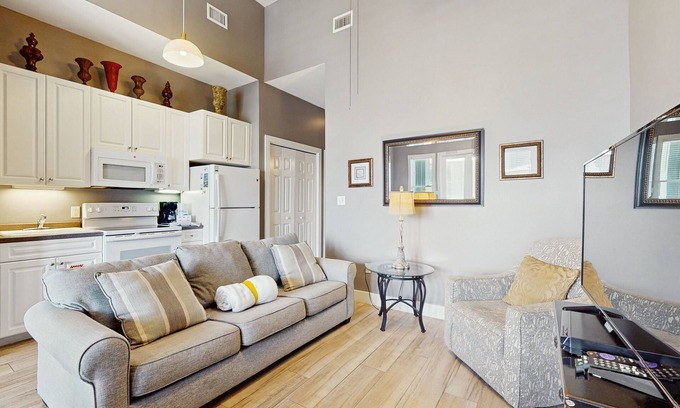 Gulf Place Apartment | Spacious condo w/large living area, private balcony & shared pool