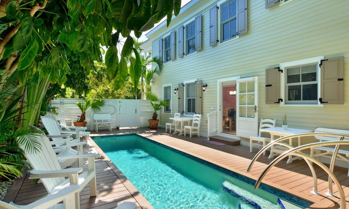 Historic Seaport Condo | STARS ~ 4 bedroom, 2 Bath Condo, Shared Heated Pool, Downtown Location!