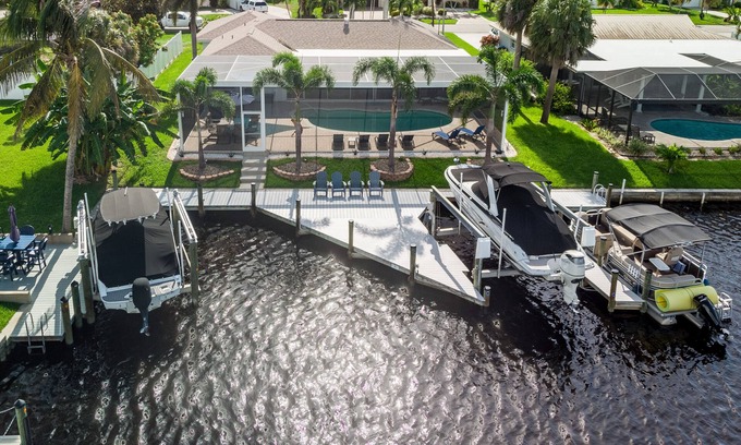 Yacht Club House | Stunning Remodel, HEATED POOL, Brand New Furnishings, Full Canal Sunset View